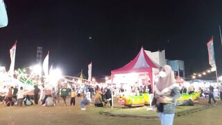 Lively Night Market with Games and Local Street Food