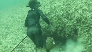 Underwater battle with big fish giant Grouper
