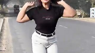 A Beautiful Women Dance on the Street