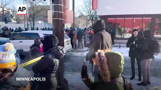 Anger and sorrow in Minneapolis after federal officer shoots man.