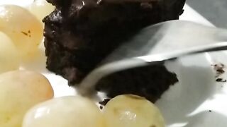 Eating brownie and grapes??