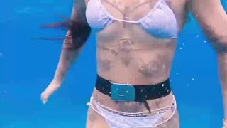 Ocean girl hot kissing with giant octopus snorkeling