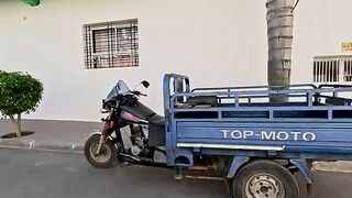 Super cute stray cat Tiger is taking a nap on a motorcycle.
