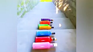 See how colur full glass bottles are react when felling from high