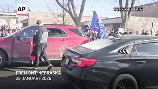 Car hits student during an anti-ICE protest outside a Nebraska high school.