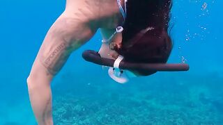 Underwater beatifull girl sexy dives ocean