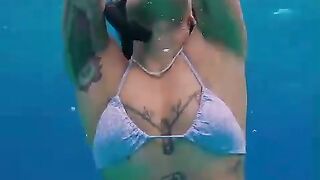 Snorkeling underwater girl sexy shake