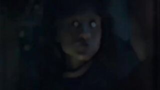 A girl who looks like she stepped out of a science fiction movie