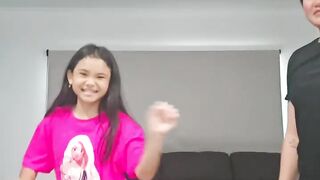 Child and his mother into Australia performance dance into her house