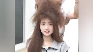 Funny hair style making by a hair designer to a women
