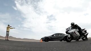 Тесла Модель S Плед против Камера Suzuki Hayabusa 2