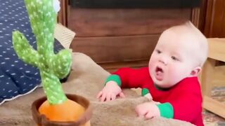 Cute babies with irritating toy