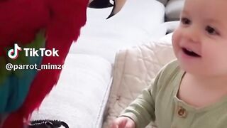 Mimzo tries to teach a baby to talk