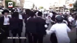 Clashes in Israel after ultra-Orthodox Jews attack two Israeli soldiers.