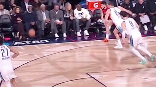 President Barack Obama comes up with the loose ball courtside!