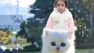Cat Lets Baby Ride, It's Wild