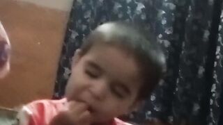 Child eating lays during sleep
