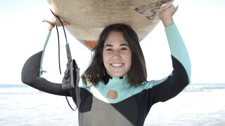 The Shy Snow Woman and the Cursed Ring - a woman carrying her surfboard | Trending HD Video