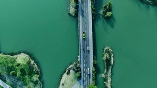 Naturehike - aerial view of bridge over scenic river | Trending HD Video