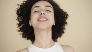 Funnyfuzzy - a woman smiling for the camera | Trending HD Video