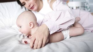 BabyBj rn - mother and baby playing on the bed | Trending HD Video