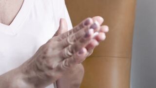 Funnyfuzzy - a woman gently applying body cream | Trending HD Video