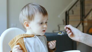 BaByliss - person feeding a child | Trending HD Video