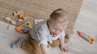 BabyBj rn - a toddler with a pacifier in mouth | Trending HD Video