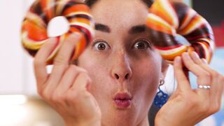 Funnyfuzzy - woman holding bagels | Trending HD Video