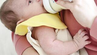 Baby Toys - mother trying to feed her crying baby | Trending HD Video