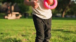 Baby Toys - a child playing with toys at the park | Trending HD Video