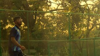 Action figure - athlete playing tennis at sunset | Trending HD Video