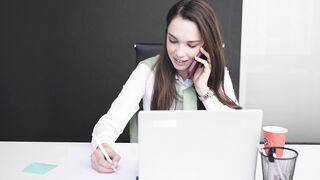 Funnyfuzzy - a woman using laptop while talking on the phone | Trending HD Video