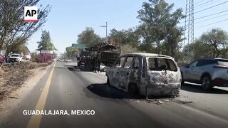 Burnt vehicles on roads in Mexico a day after army killed cartel leader 'El Mencho'.