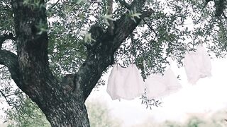 Action figure - white clothes hanged under the tree | Trending HD Video