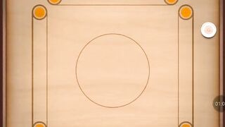 Playing_Carrom_Disc_Pool_for_the_first_time.