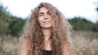 Funnyfuzzy - a woman blowing her hair | Trending HD Video