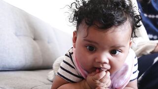 BabyBj rn - video of a baby girl biting her pacifier | Trending HD Video