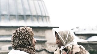 Action figure - two women conversing by a historic dome | Trending HD Video