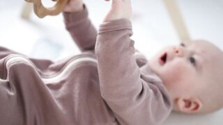Babymoov - a baby playing his hanging toy | Trending HD Video