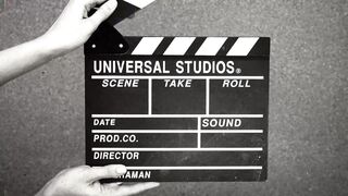 Action figure - a vintage clapperboard used in making film scenes | Trending HD Video
