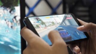 Action figure - mobile games in a cellular phone | Trending HD Video