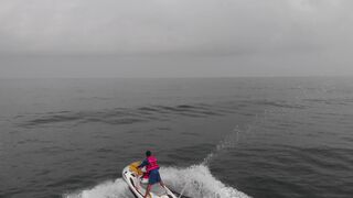 Action figure - a person riding a jet ski | Trending HD Video