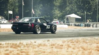 Action figure - racing cars on curve of race track | Trending HD Video