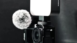 Action figure - compact adventure camera with attached microphone | Trending HD Video