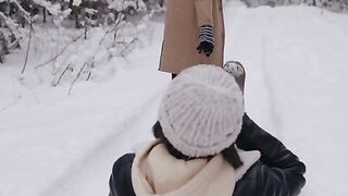 Man Pulling a Person on a Sled