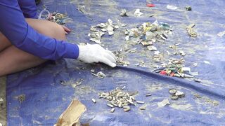 BabyBj rn - eco friendly beach cleanup with volunteers | Trending HD Video