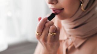 The Shy Snow Woman and the Cursed Ring - a person applying lipstick | Trending HD Video