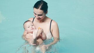 Woman Within - woman and child in the swimming pool | Trending HD Video
