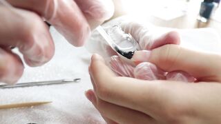 Wonder Woman - manicure taking care of a woman s nails | Trending HD Video